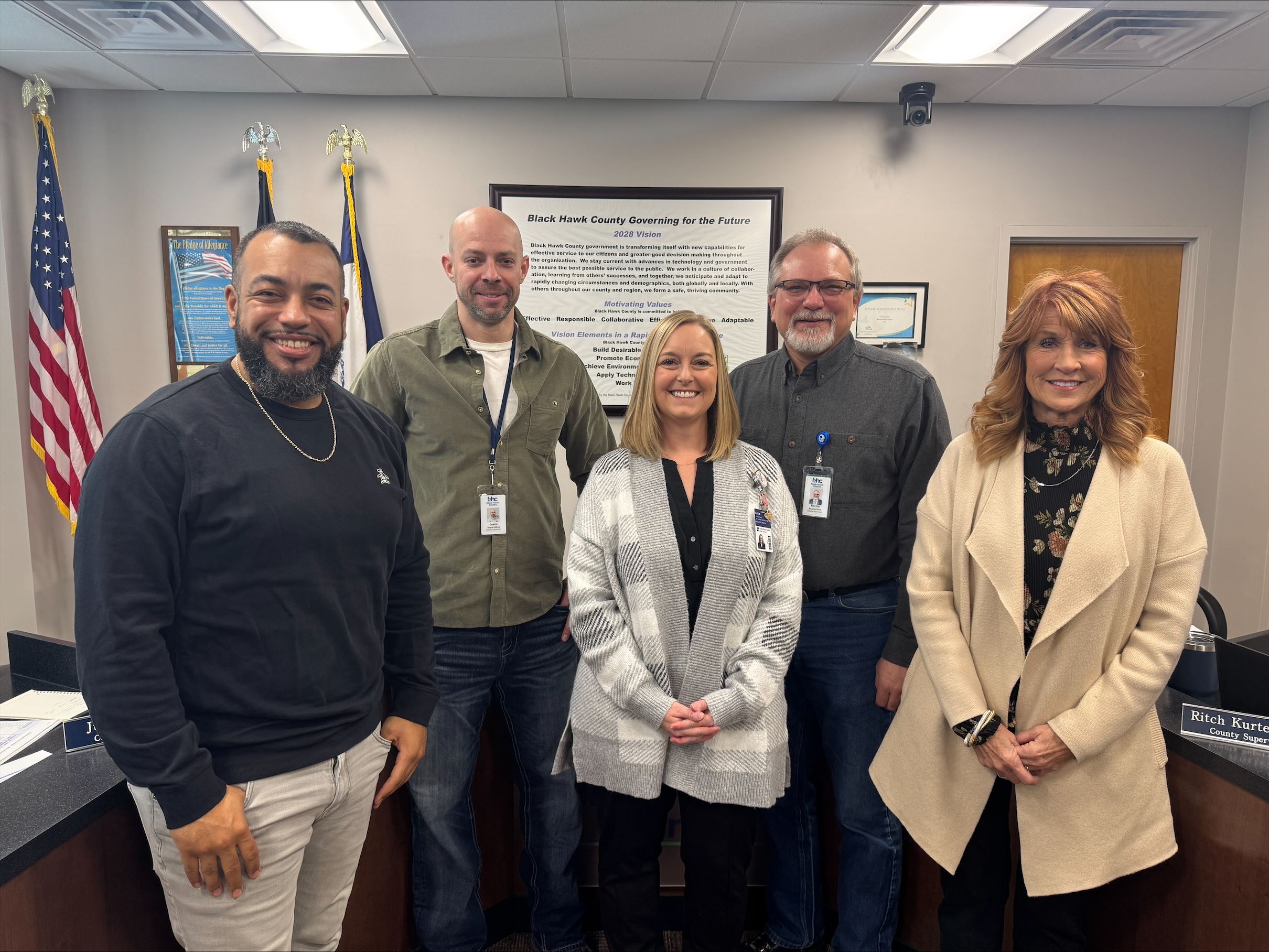 Photo of the BOS standing with Child Abuse Prevention advocate.